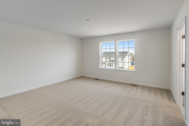 224 Camwood Ct, Fredericksburg, VA 22405 - unfurnished room with visible vents, baseboards, and light carpet