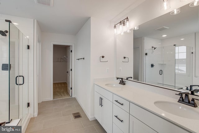 224 Camwood Ct, Fredericksburg, VA 22405 - bathroom featuring a shower stall, a sink, and visible vents