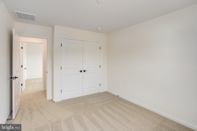 224 Camwood Ct, Fredericksburg, VA 22405 - unfurnished bedroom with visible vents, baseboards, a closet, and carpet floors