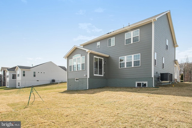 224 Camwood Ct, Fredericksburg, VA 22405 - back of property featuring central AC and a lawn