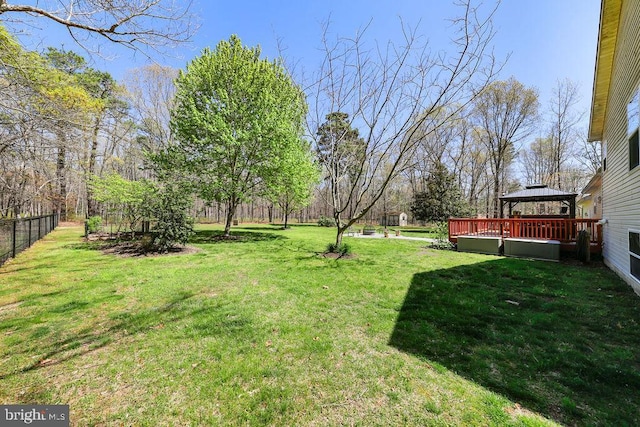 view of yard with a gazebo and fence