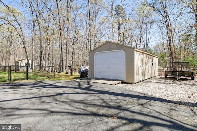 detached garage with fence