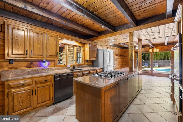 74 Madison Rd, Elmer, NJ 08318 - kitchen featuring appliances with stainless steel finishes, wood ceiling with exposed beams, a sink, wood walls, and light tile patterned flooring