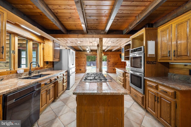 74 Madison Rd, Elmer, NJ 08318 - kitchen featuring appliances with stainless steel finishes, a sink, a kitchen island, wooden ceiling with exposed beams, and light stone countertops