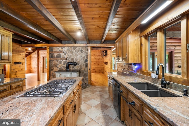 74 Madison Rd, Elmer, NJ 08318 - kitchen with a sink, stainless steel gas cooktop, wooden ceiling with exposed beams, wooden walls, and light stone countertops