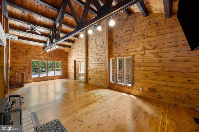 74 Madison Rd, Elmer, NJ 08318 - unfurnished living room featuring wooden ceiling, wooden walls, ceiling fan, and hardwood / wood-style flooring