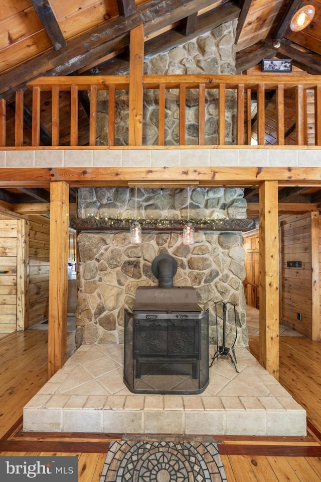 74 Madison Rd, Elmer, NJ 08318 - detailed view of wood finished floors, a wood stove, and wood walls