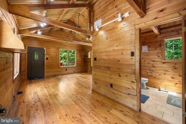 74 Madison Rd, Elmer, NJ 08318 - empty room featuring wood walls, wooden ceiling, and light wood finished floors