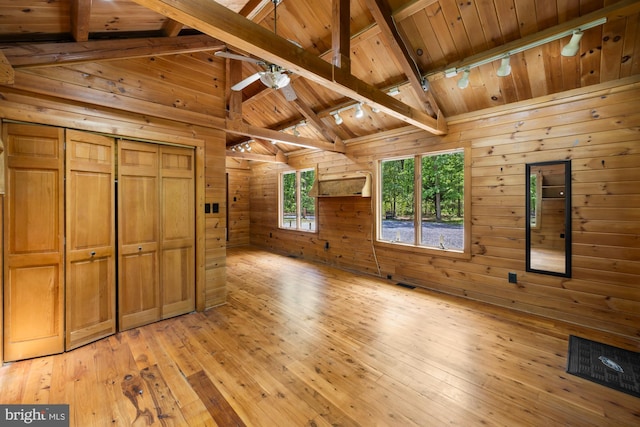 74 Madison Rd, Elmer, NJ 08318 - unfurnished bedroom with wooden ceiling, rail lighting, wooden walls, and light wood-style flooring