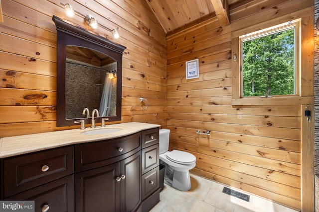74 Madison Rd, Elmer, NJ 08318 - bathroom featuring wood ceiling with exposed beams, toilet, tile patterned flooring, vanity, and wooden walls