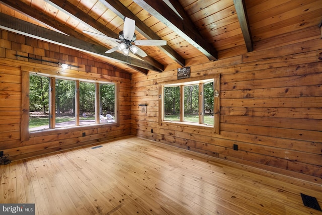 74 Madison Rd, Elmer, NJ 08318 - empty room with wood ceiling, wooden walls, plenty of natural light, wood-type flooring, and ceiling fan