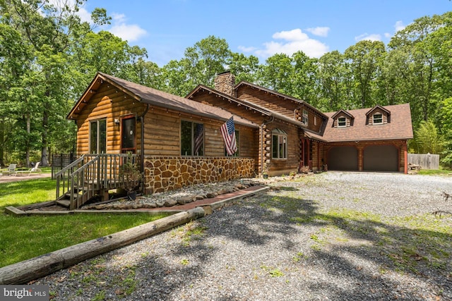 74 Madison Rd, Elmer, NJ 08318 - cabin with a chimney, driveway, a garage, stone siding, and a shingled roof