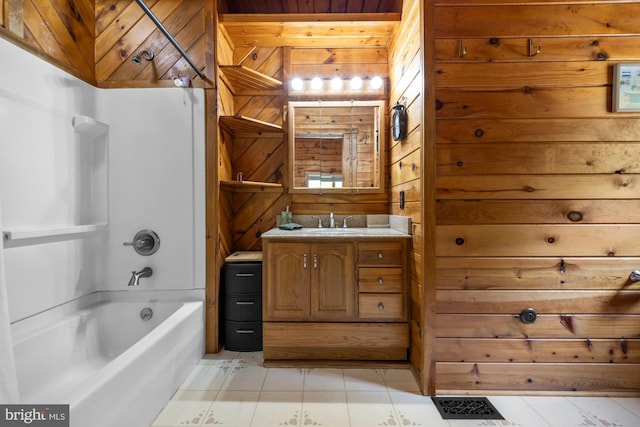 74 Madison Rd, Elmer, NJ 08318 - full bathroom with wood walls, vanity, bathing tub / shower combination, tile patterned floors, and wooden ceiling