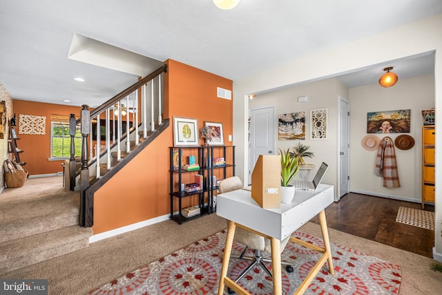 carpeted office space with visible vents, baseboards, and recessed lighting