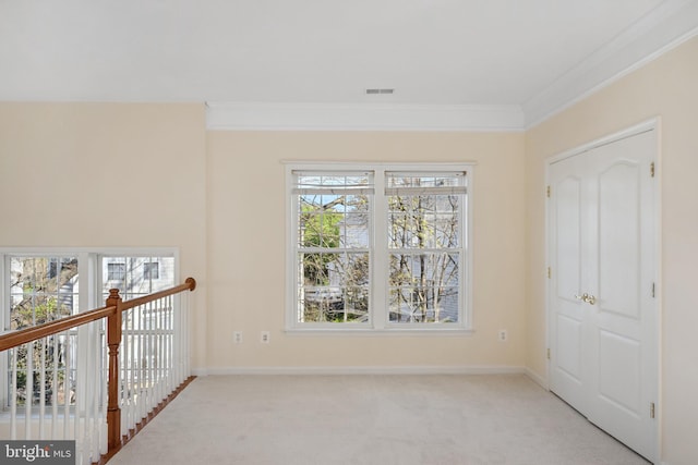 40396 Milford, Ashburn, VA 20148 - unfurnished room with crown molding, light colored carpet, baseboards, and visible vents