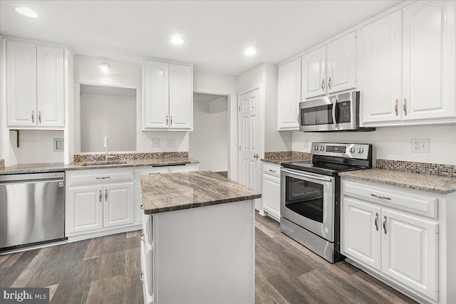 8794 Inspiration Ct, Walkersville, MD 21793 - kitchen with recessed lighting, stone countertops, a sink, appliances with stainless steel finishes, and dark wood-style flooring