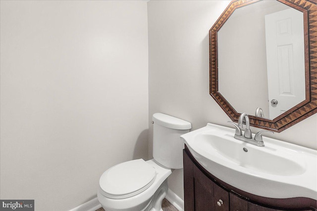 8794 Inspiration Ct, Walkersville, MD 21793 - bathroom with vanity, toilet, and baseboards