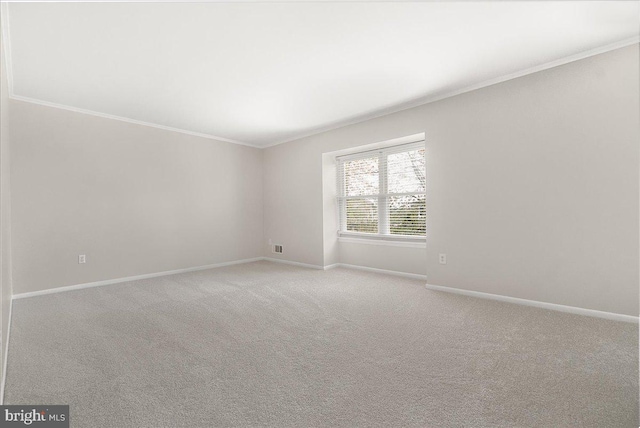 8794 Inspiration Ct, Walkersville, MD 21793 - unfurnished room with baseboards, ornamental molding, and carpet flooring