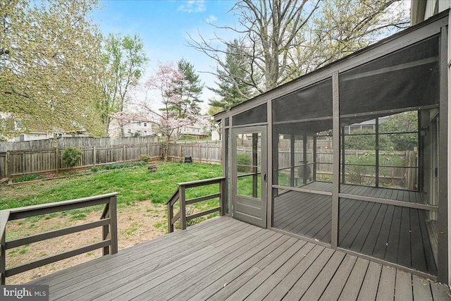 8794 Inspiration Ct, Walkersville, MD 21793 - wooden deck with a lawn, a fenced backyard, and a sunroom