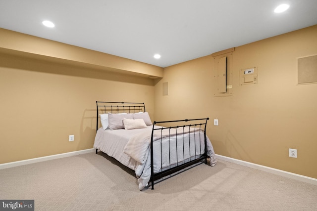 bedroom featuring recessed lighting, baseboards, and light carpet