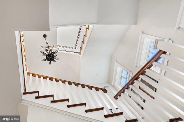 stairway with a towering ceiling