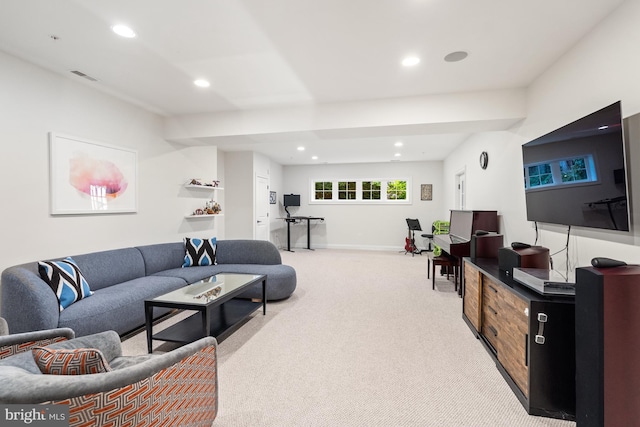living area with light carpet, recessed lighting, visible vents, and baseboards