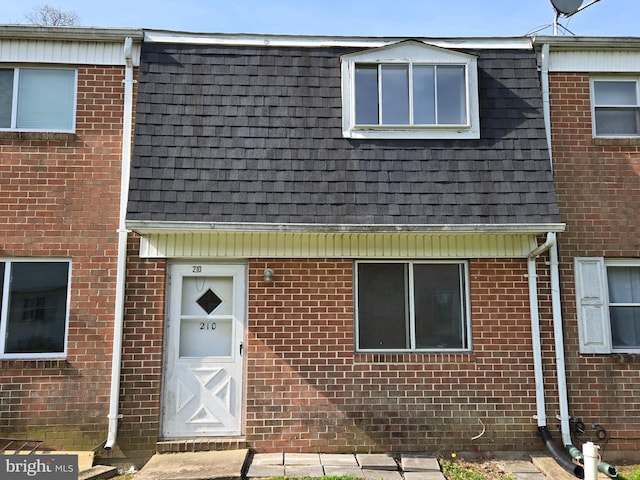 210 Aster Ln, Forest Hill, MD 21050 - view of front of home with mansard roof, a shingled roof, and brick siding