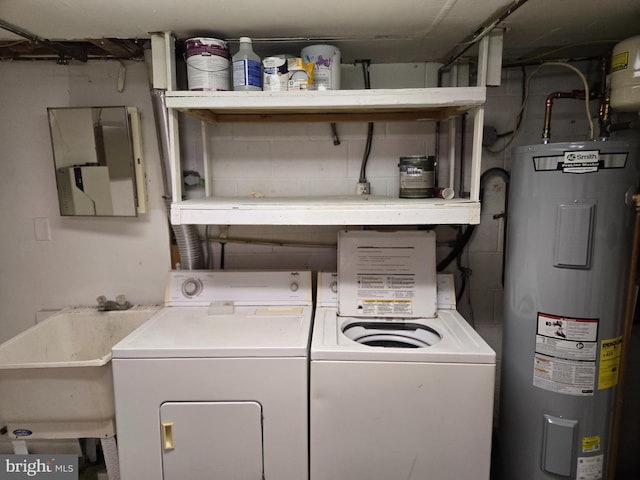 210 Aster Ln, Forest Hill, MD 21050 - laundry area with electric water heater and separate washer and dryer