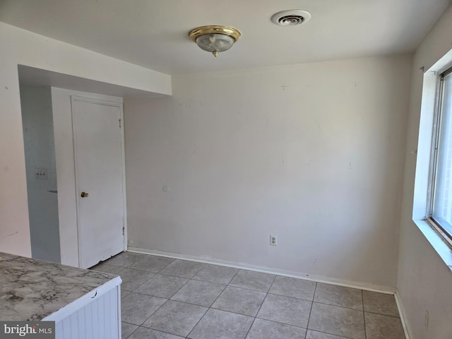 210 Aster Ln, Forest Hill, MD 21050 - unfurnished dining area featuring light tile patterned floors and baseboards
