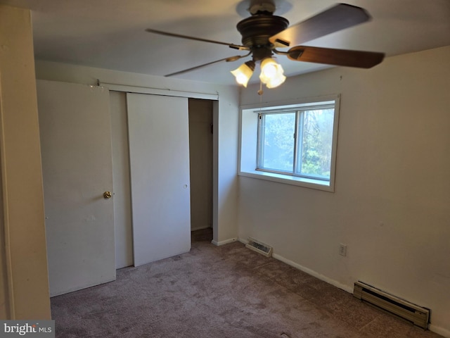 210 Aster Ln, Forest Hill, MD 21050 - unfurnished bedroom with a baseboard radiator, carpet floors, a closet, and ceiling fan