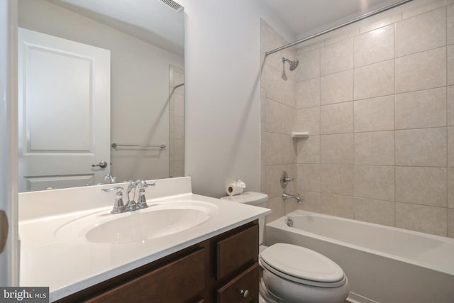 full bath with toilet, bathing tub / shower combination, and vanity