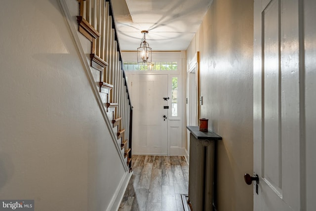 4870 Homeville Rd, Cochranville, PA 19330 - entryway featuring a chandelier, wood finished floors, and stairway
