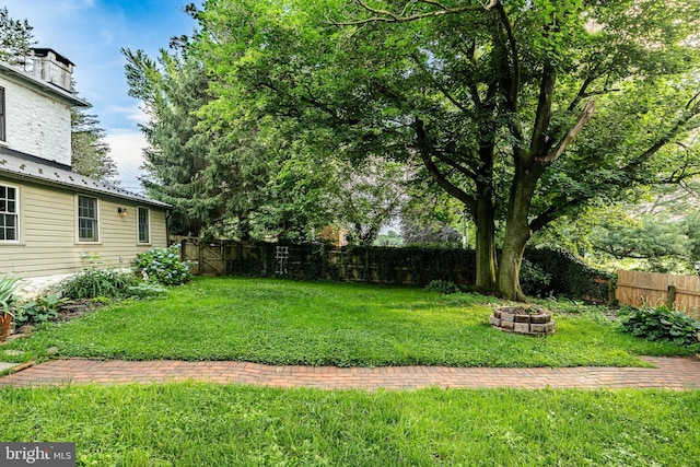 4870 Homeville Rd, Cochranville, PA 19330 - fenced backyard with an outdoor fire pit