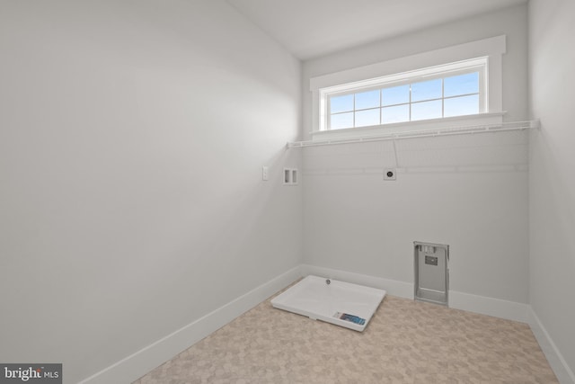 laundry room with baseboards, hookup for an electric dryer, laundry area, and hookup for a washing machine