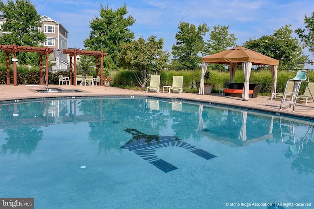 pool featuring a gazebo, a patio area, and a pergola