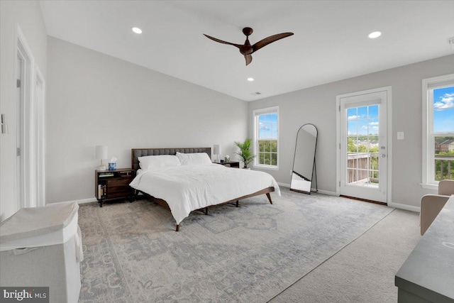 bedroom with baseboards, light carpet, recessed lighting, and access to exterior