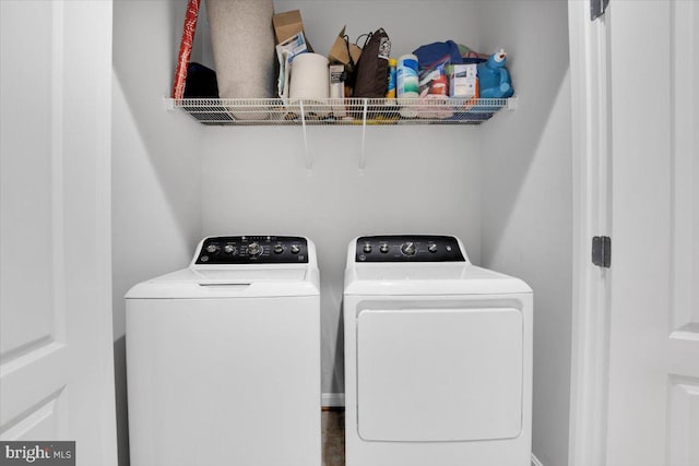 laundry room featuring independent washer and dryer and laundry area