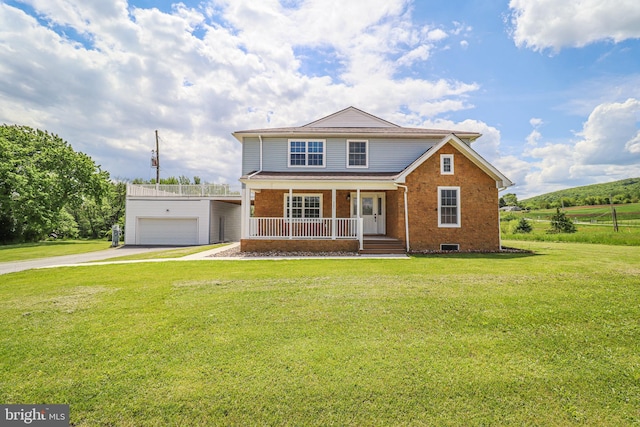 1111 S Mountain Rd, Dillsburg, PA 17019 - traditional-style home with covered porch, driveway, brick siding, and a front yard