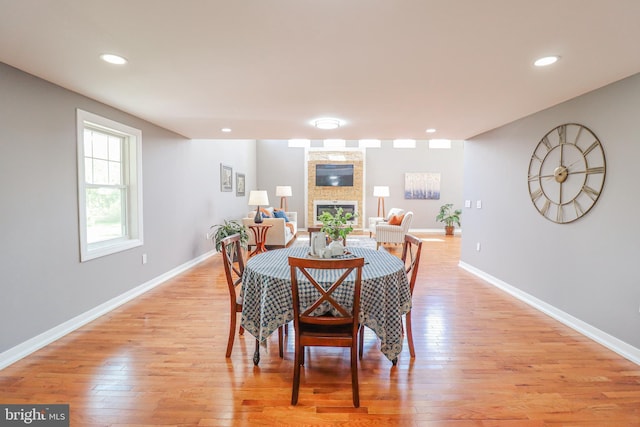 1111 S Mountain Rd, Dillsburg, PA 17019 - dining space with a fireplace, light wood finished floors, baseboards, and recessed lighting