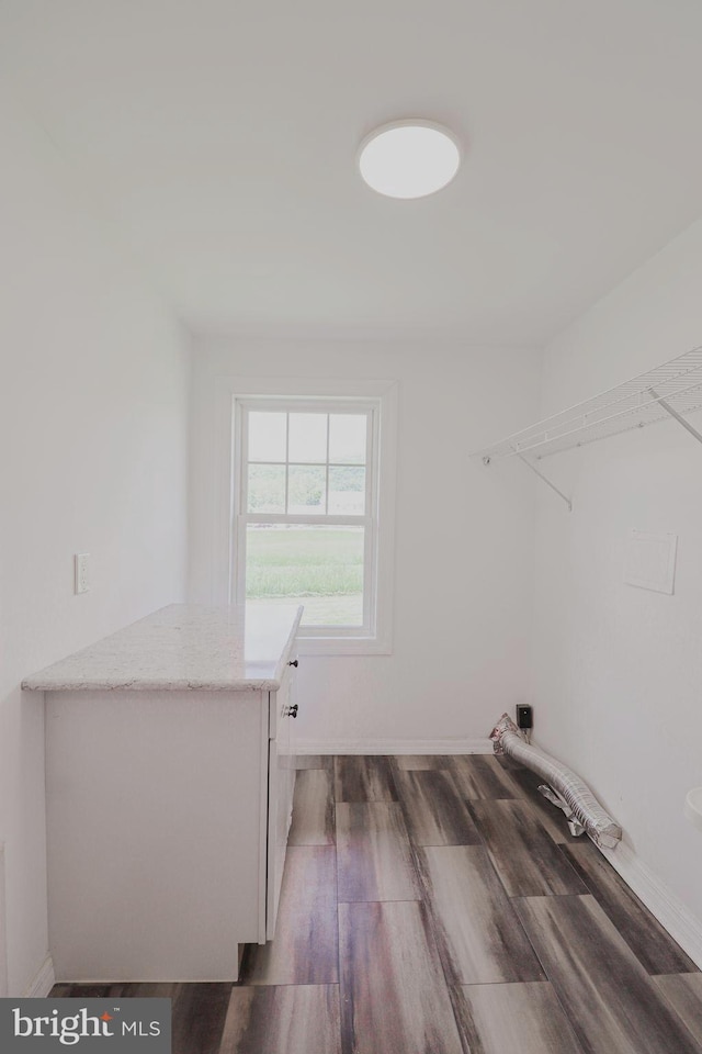 1111 S Mountain Rd, Dillsburg, PA 17019 - laundry room featuring dark wood-style floors and baseboards