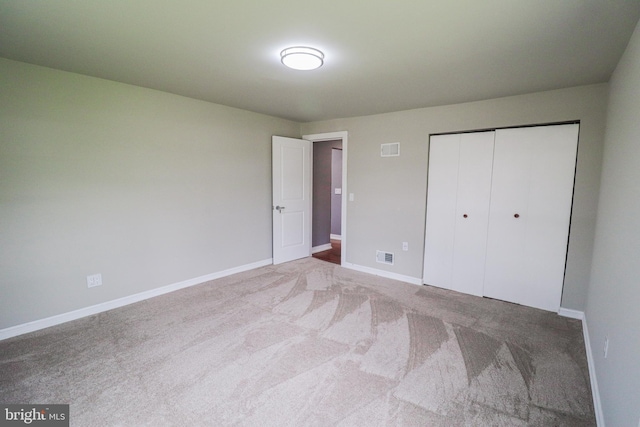 1111 S Mountain Rd, Dillsburg, PA 17019 - unfurnished bedroom with carpet floors, baseboards, and a closet