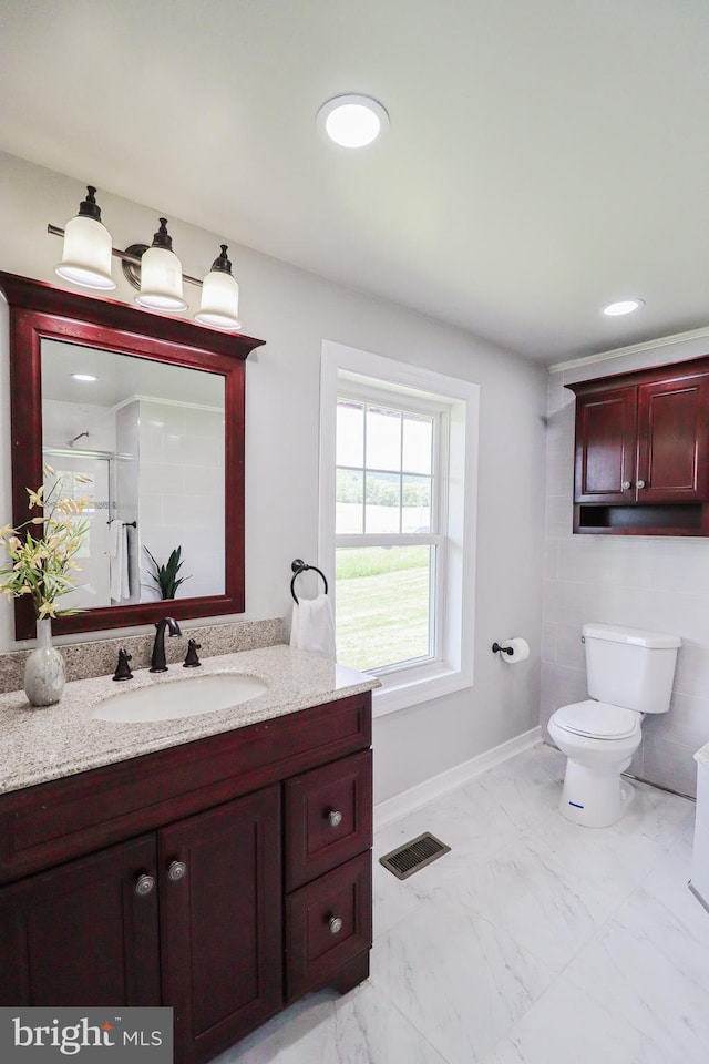 1111 S Mountain Rd, Dillsburg, PA 17019 - full bathroom featuring toilet, vanity, marble finish floors, and an enclosed shower