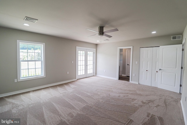 1111 S Mountain Rd, Dillsburg, PA 17019 - unfurnished bedroom with carpet flooring, multiple windows, recessed lighting, baseboards, and ensuite bathroom