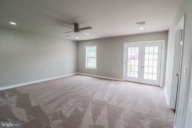 1111 S Mountain Rd, Dillsburg, PA 17019 - spare room with a ceiling fan, light carpet, baseboards, recessed lighting, and french doors