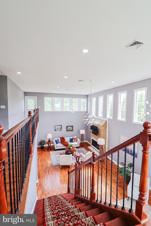 1111 S Mountain Rd, Dillsburg, PA 17019 - living area featuring wood finished floors, recessed lighting, a fireplace, baseboards, and a chandelier
