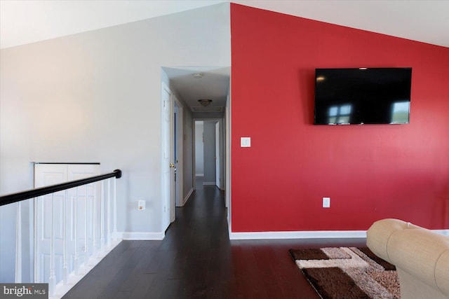 617 Castlewood Dr, Upper Marlboro, MD 20774 - corridor featuring vaulted ceiling, baseboards, and dark wood-style floors