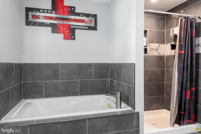 617 Castlewood Dr, Upper Marlboro, MD 20774 - bathroom featuring a garden tub and a stall shower