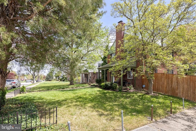 view of yard with fence