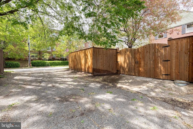 exterior space with a gate and fence