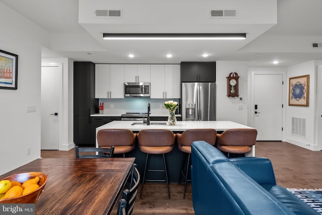 1501 N 31st St Unit 318, Philadelphia, PA 19121 - kitchen featuring appliances with stainless steel finishes, light countertops, and visible vents